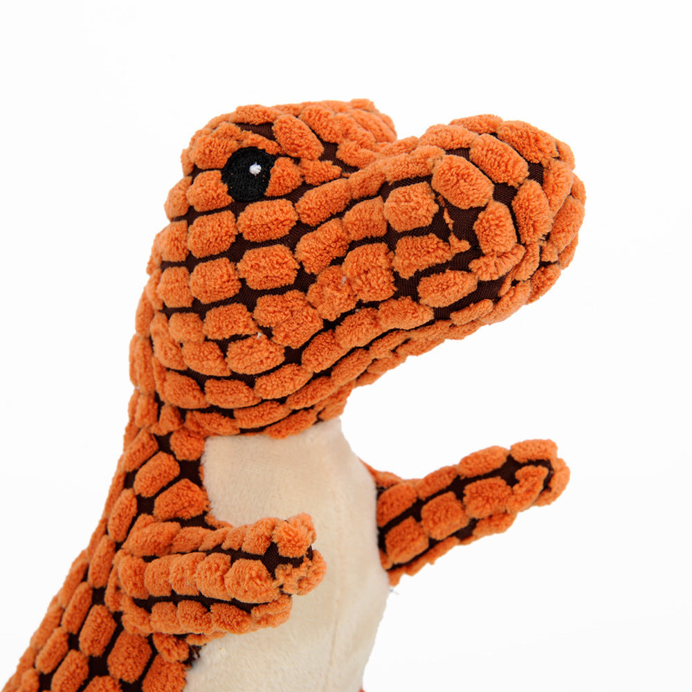 Orange plush dinosaur dog toy for large dogs with textured soft fabric from Pet Pleasers Shop