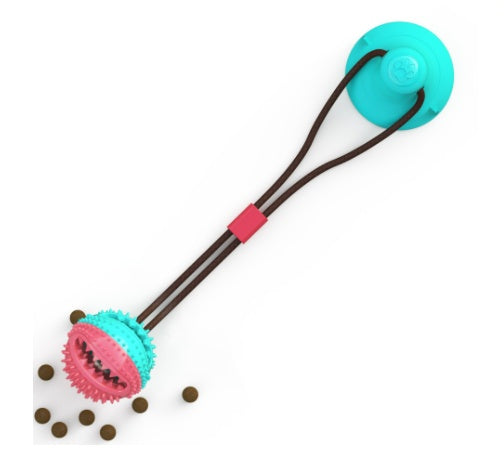 Pet Pleasers Shop interactive dog suction cup toy with pink and blue textured ball and brown elastic cord