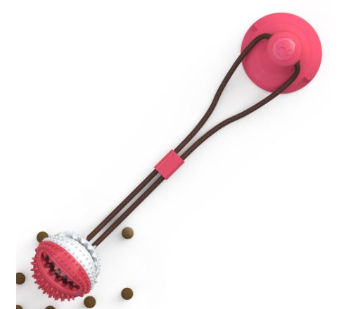 Pet Pleasers Shop interactive dog suction cup toy in pink with durable chew ball and strong suction base